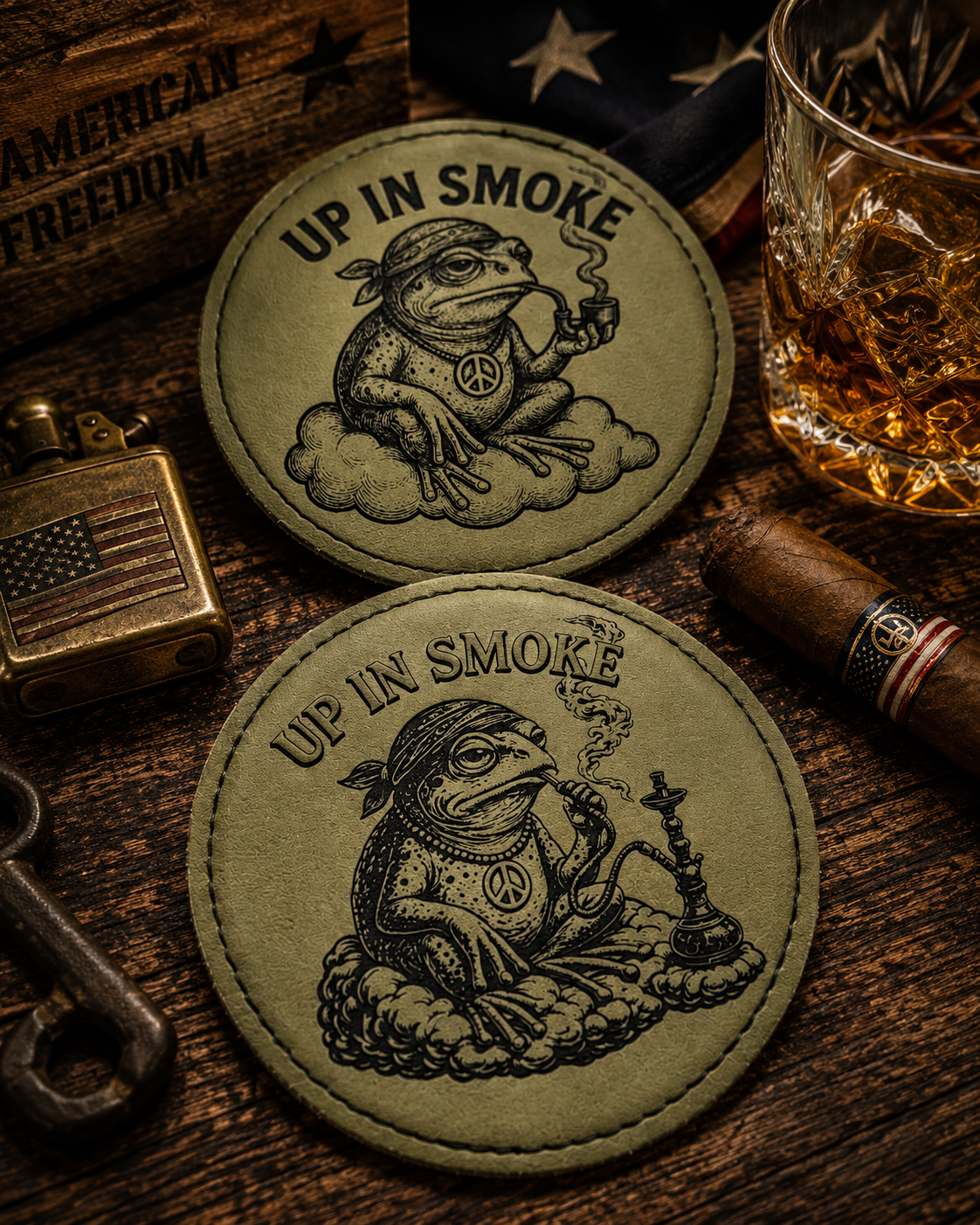 Two olive green round leatherette coasters laser-engraved with Up In Smoke frog smoking pipe design
