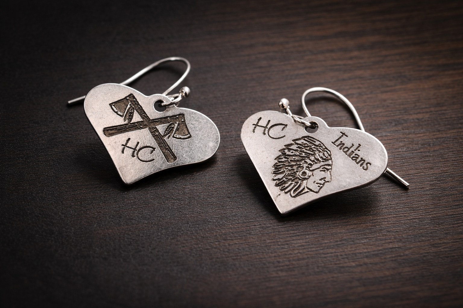 Custom engraved silver heart earrings with HC Indians logo