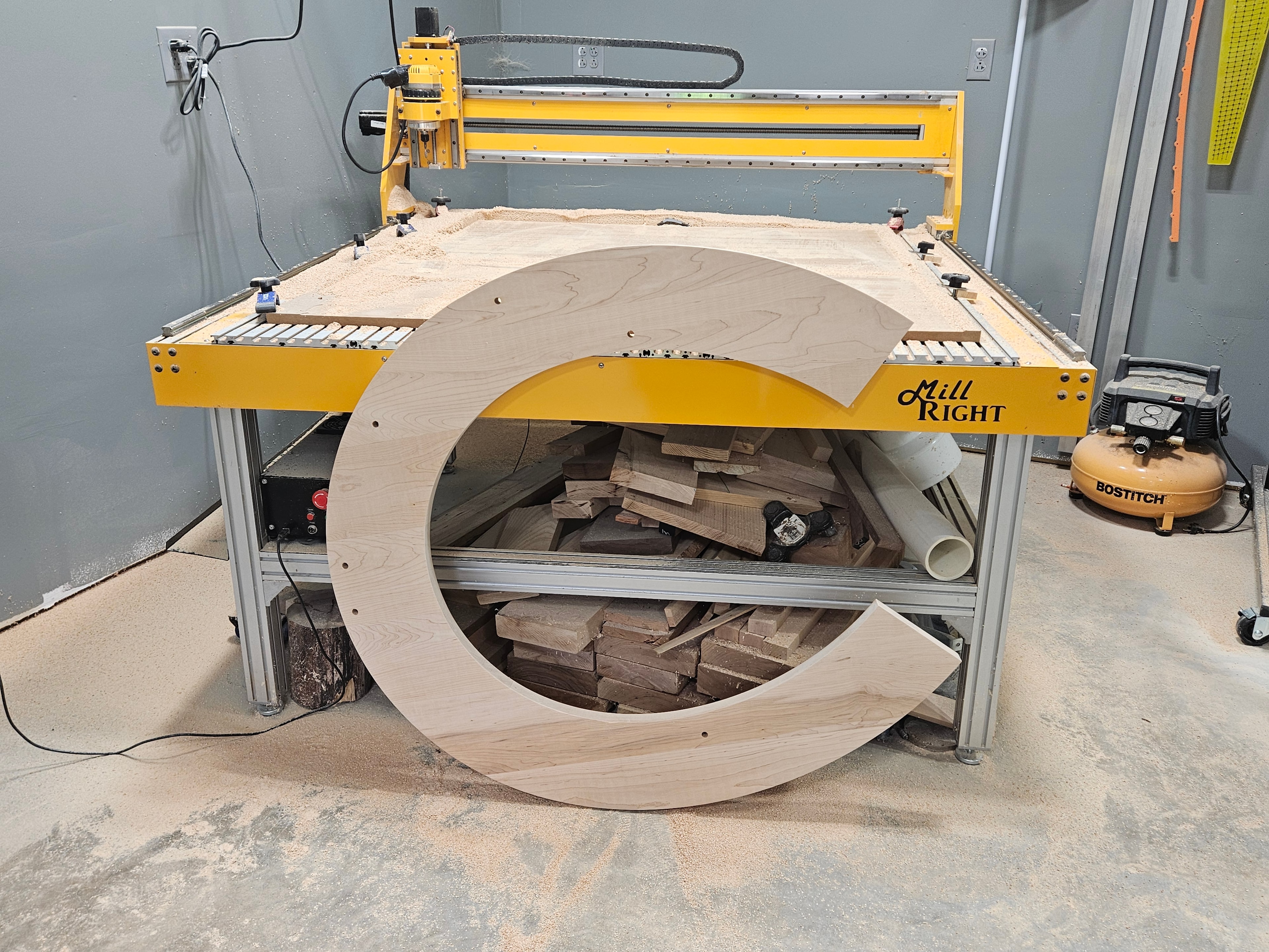 Mill RIGHT CNC machine with large wooden C letter cutout