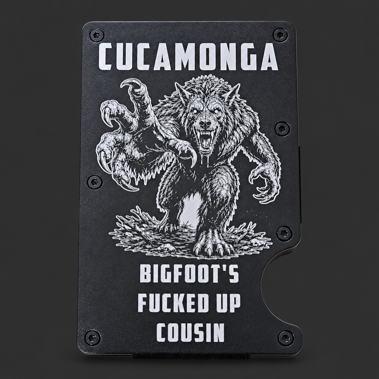 Engraved metal wallet on studio gray