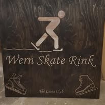 Wern Skate Rink laser engraved dark wood sign Lions Club