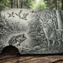 Aluminum wallet laser engraved with detailed deer bass and ducks nature scene