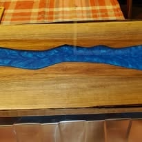 Live edge cedar board with purple resin lightning bolt inlay