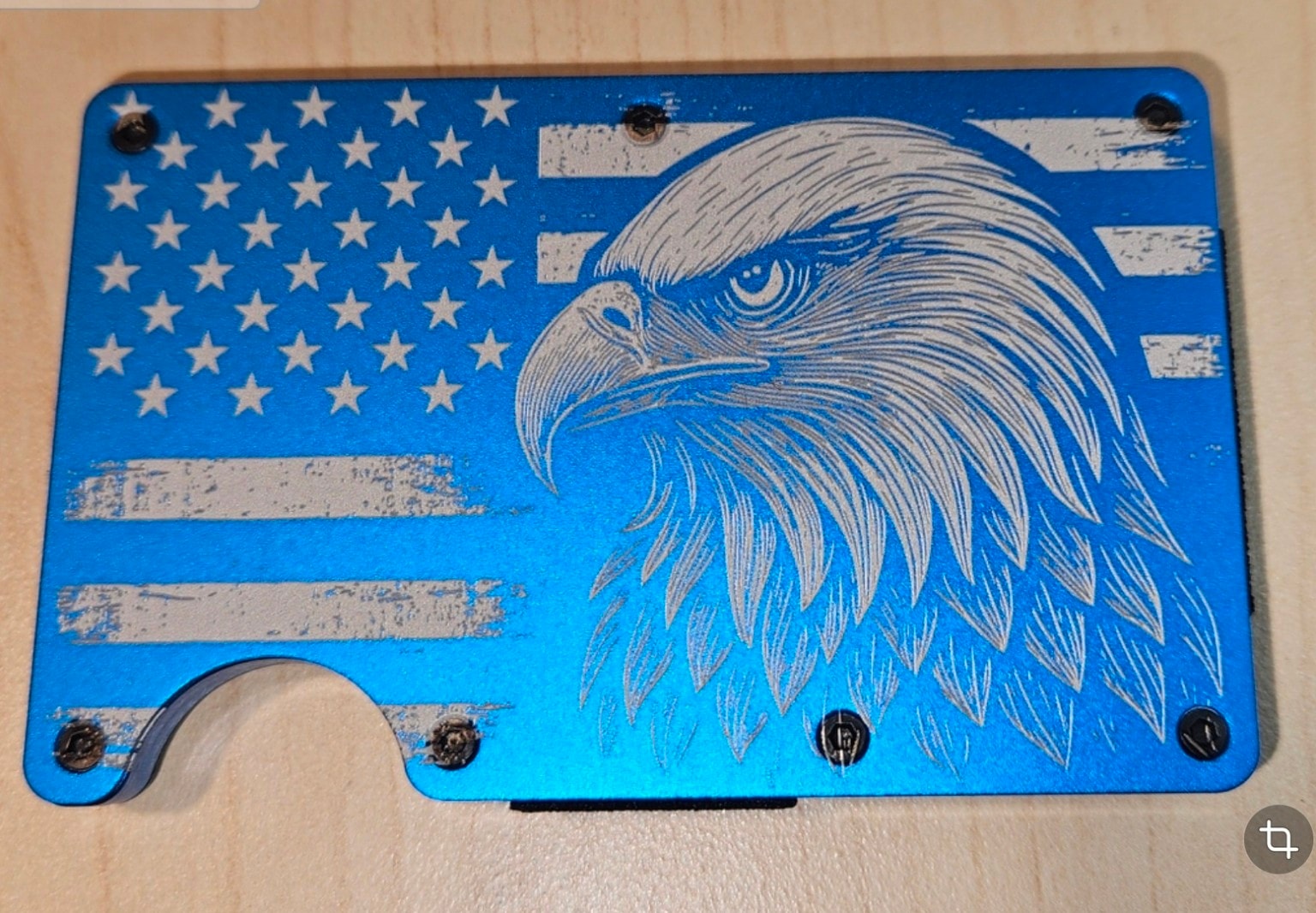 Blue aluminum wallet laser-engraved with bald eagle and American flag design